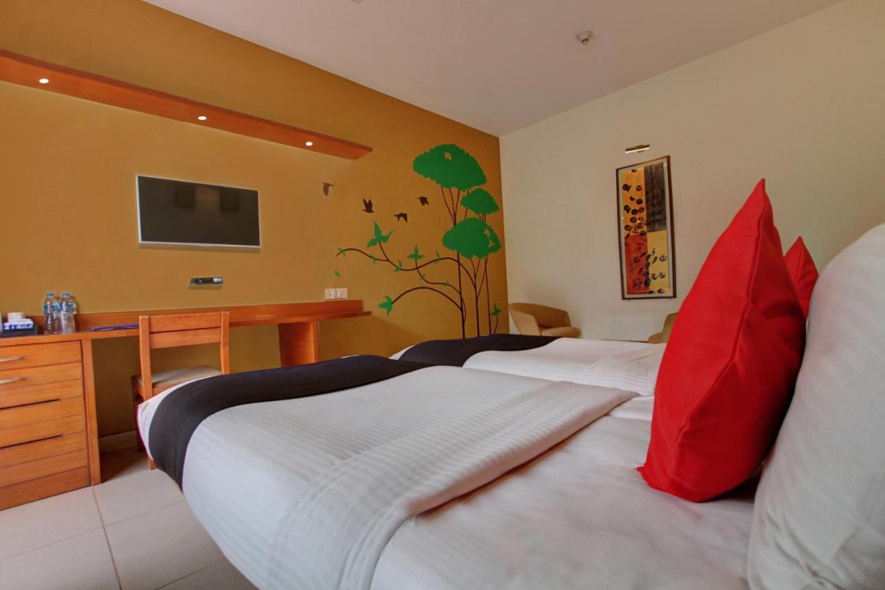 Capital O 16165 Cartier Hotel บังกาลอร์ ห้อง รูปภาพ